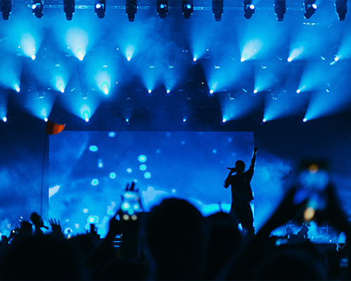 Concert state with Silhouette of figure.